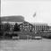 Kort: Gausdal. Gausdal Sanatorium med Kampen. 18/6 1903. Bygning, busker, trær, flagg, benker.