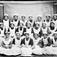 18.03.1905. Gudbrandsdalens Amtskole. Pikene i kjøkkendrakt. Skolebilde