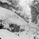 Kort: Nord-Fron 16.01.1909. Islagt Vinstraelv sett ovenfra, tømmer, vinterlandskap.