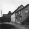 Storgata 22, Drøbak, Frogn, Akershus 1910. Gatebilde med gamle trehus.