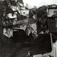 Fredensborg, Oslo ca. 1950. Trehusbebyggelse, boliger, uthus og.trapper. Mann og kvinne ved vannpost.