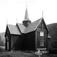 Nore stavkirke, Numedal, Buskerud. 1930. Kirkegård. Skog og åser i bakgrunnen.