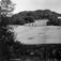 Skaugum, Asker, Akershus. 1932. Husene sett fra nedsiden.  Landskap med jorder og skog.