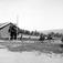 Hurum prestegård, del av gårdstun med driftbygninger, vanningsplass (dam) og beiteområde med hester. Fotografens svoger, Olaf A. Holm var sokneprest i Hurum 1897-1904.
Fra malerinne Juliane Fredrikke Langbergs (1856-1930) samling, tatt ca.1895-1910 med motivkrets slekt og venner samt steder tilknyttet samvær med disse.