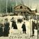 Postkort. Julehilsen. Fotografisk motiv. Vintermotiv. Fra Frognerseteren? Skiløpere. Fotgjengere. Datert 23.12.1905.