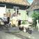 Levendegjøring på museum.
Ferieskolen august 2002.
Fra gårdsplassen til Johannesgate 12 bygning nr. 203, og 14 bygning nr. 204 på Enerhaugen, hvor noen av barna og noen høns koser seg i sola.
Norsk Folkemuseum, Bygdøy.
