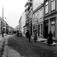 Storgata sett østover..Ludvig Sættem`s butikk til venstre..Molde privatbank holdt til i huset til venstre mellom 1916 og 1934..Skredder Sagen til venstre for banken..N.P Dahl til høyre. .Sparebanken til høyre..
