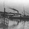 Moldekaia med dampskipet D/S Rauma.Like etter den var kjøpt av det nystartede Romsdals Dampskipselskap i 1888..Grand hotell i bakgrunnen . .(Bruk bilde R.Fot.01463)