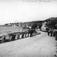 Molde sett fra Strandgata ca 1910. .Alexander Kielland er ute på sin spasertur. .Huset til høyre er Strandgata 23 (tidligere Olaus Larsen) til venstre Molde kommunes sjøbrygge, (tidligere Amtmannsbrygga.) Strandgata 16. Bildet tatt ved Strandgata 27..Alexander Lange Kielland døde i Bergen 6. april 1906. Det er sannsynlig at bildet er tatt mellom 1902 og 1906, da Kielland var amtmann i Romsdals amt..(Bilde erstattes av 