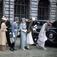 Firandet av Gustav V:s 80-årsdag på Stockholms slott den 16 juni 1938. Medlemmar ur kungens familj på väg mot bilarna.