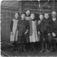 Lærer Kluge med elever, ved Trondheim Off. Skole for Døve i ca 1915